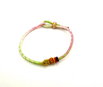 Bracelet Porte-Bonheur Tibétain – Corde Bénie Rose - Univers Tibet