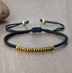 Schwarzes handgeflochtenes tibetisch-buddhistisches Armband