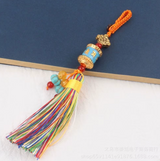 Porte-Clés Roue de Prière et Mantra Vajra avec Pompon