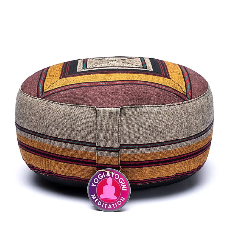 Ochre and burgundy meditation cushion with geometric patterns