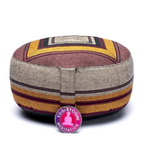 Ochre and burgundy meditation cushion with geometric patterns