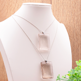 Pendentif Noctis – Cristal de Roche Fumé AA, Pierre Plate Rectangle - univers tibet