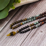 Mala Tibétain Oeil-de-Tigre et turquoise