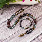Mala Tibétain Oeil-de-Tigre et turquoise