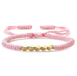 bracelet tibétain porte bonheur orné de perles de cuivre Rose - Univers Tibet