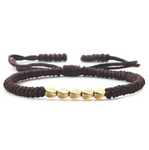 bracelet tibétain porte bonheur orné de perles de cuivre marron - univers tibet