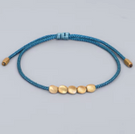 bracelet tibetain de la chance 4 perles de cuivre - univers tibet