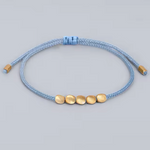 bracelet tibetain de la chance 4 perles de cuivre bleu ciel - univers tibet